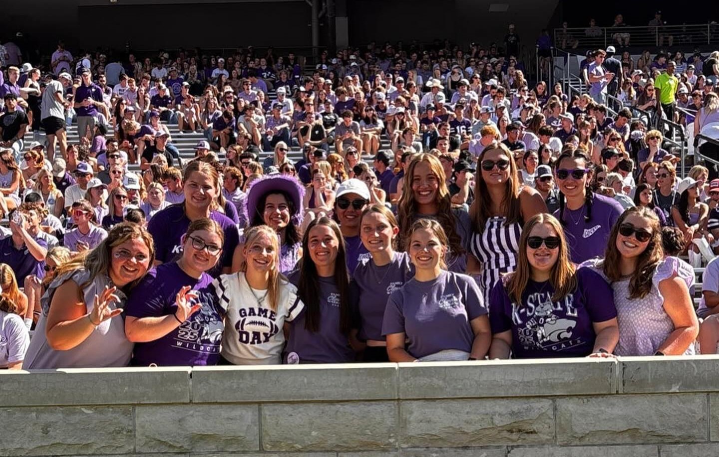 photo of women at a K-State Football game